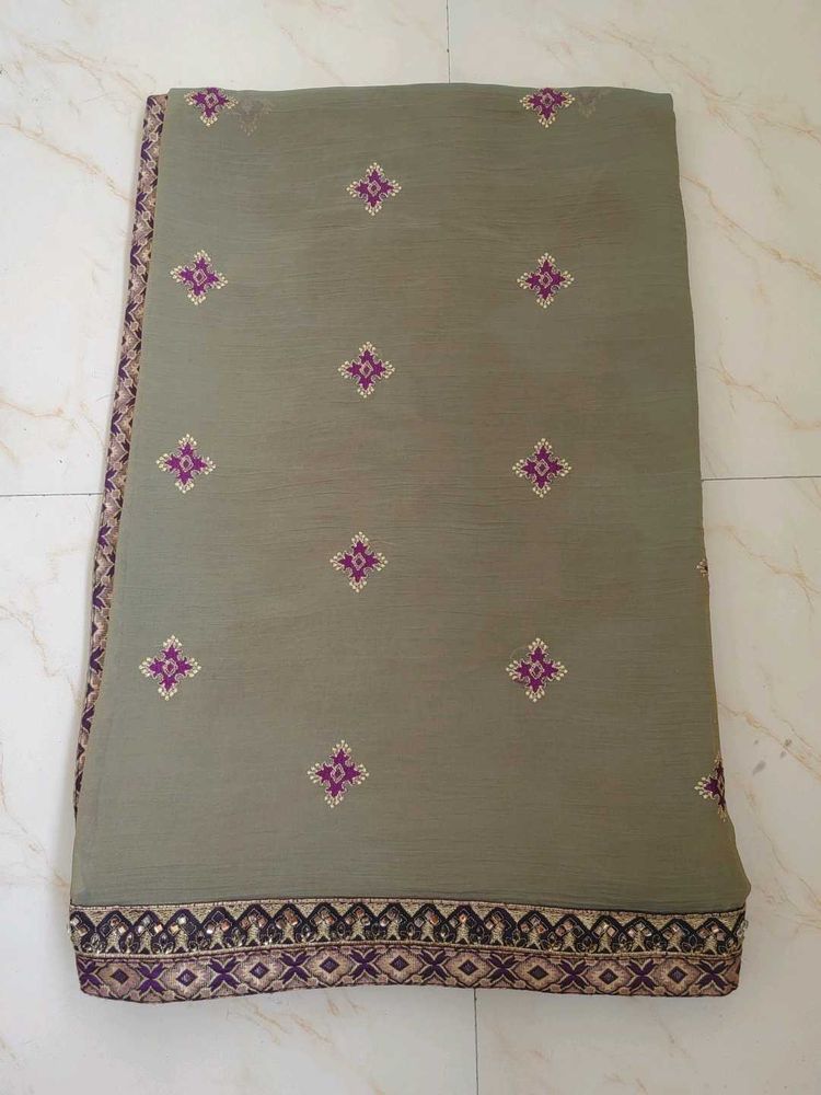 Elegant Mehendi Green Saree with fancy Blouse