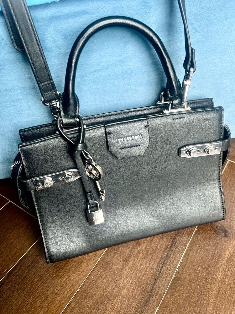 LYN Black Leather Satchel With A Missing Fitting