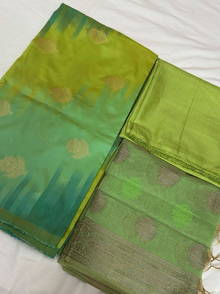 Green banarasi zari suit.