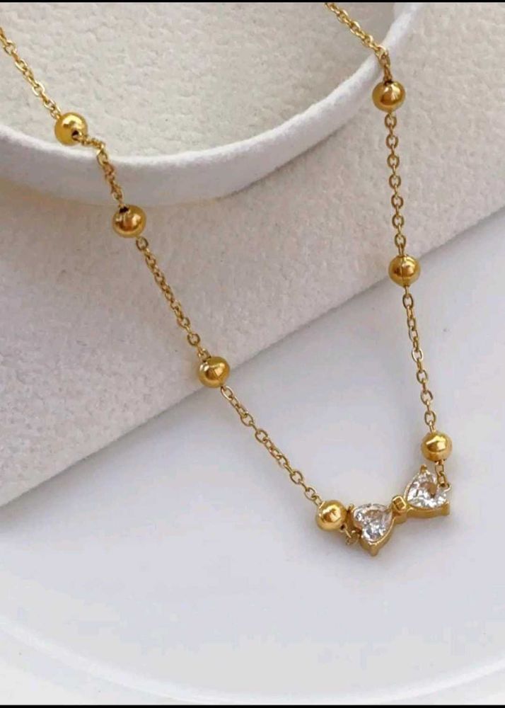 Gold Bow Necklace
