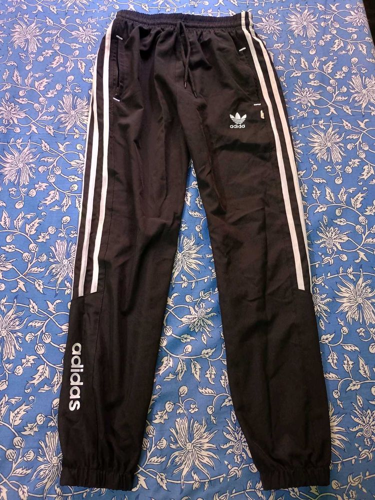 black joggers pants white stripes sweatpants grip