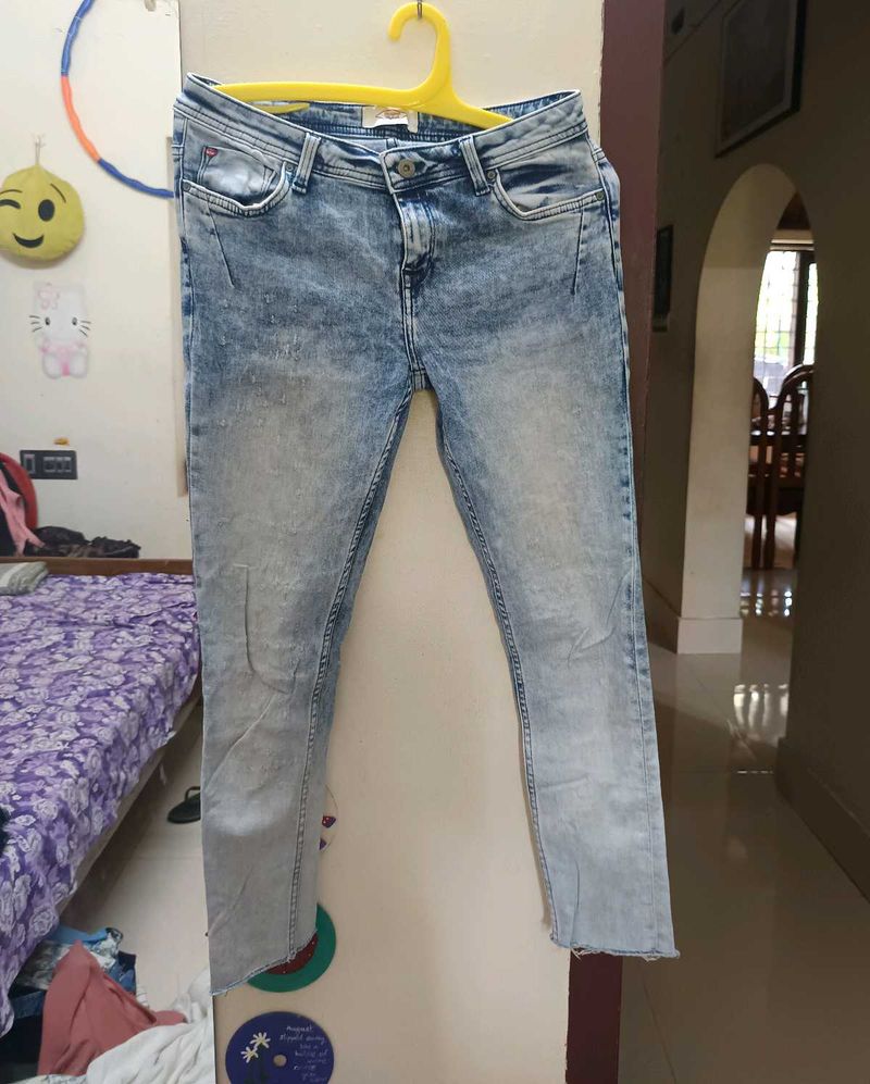 Lee Cooper slightly ripped jeans.