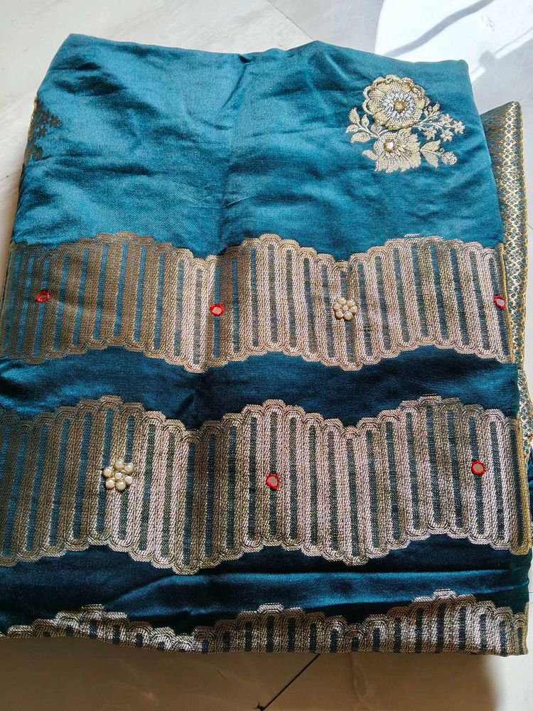 Elegant Teal Embroidered Saree