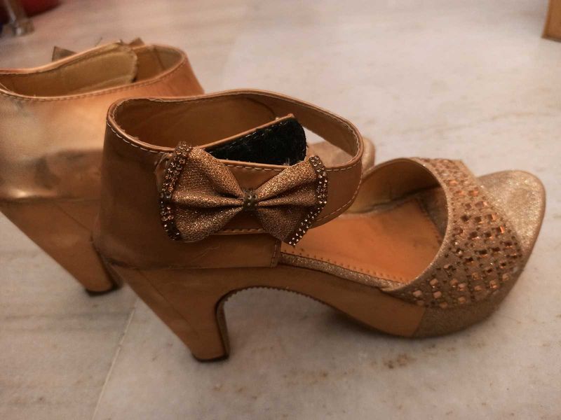 Gold Heels with Bow Detail