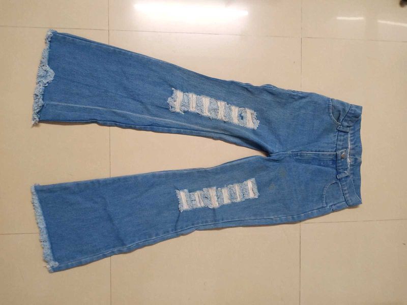 Ripped Blue Jeans