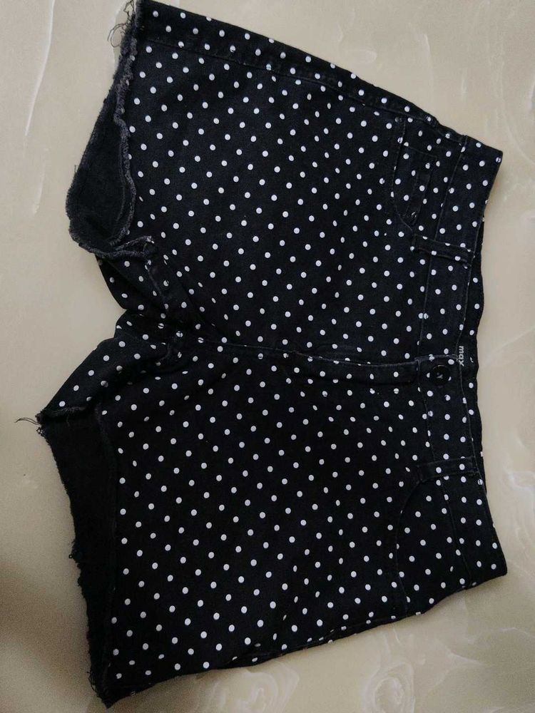 A beautiful black hipster shorts with polka dots.