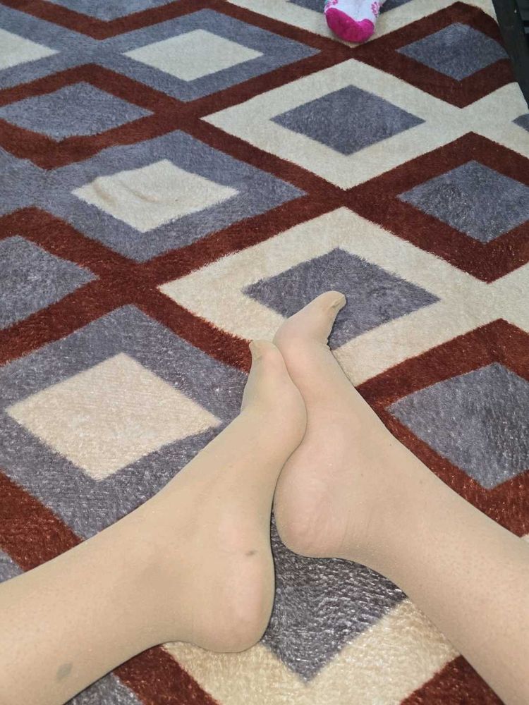 used beige skin touch socks