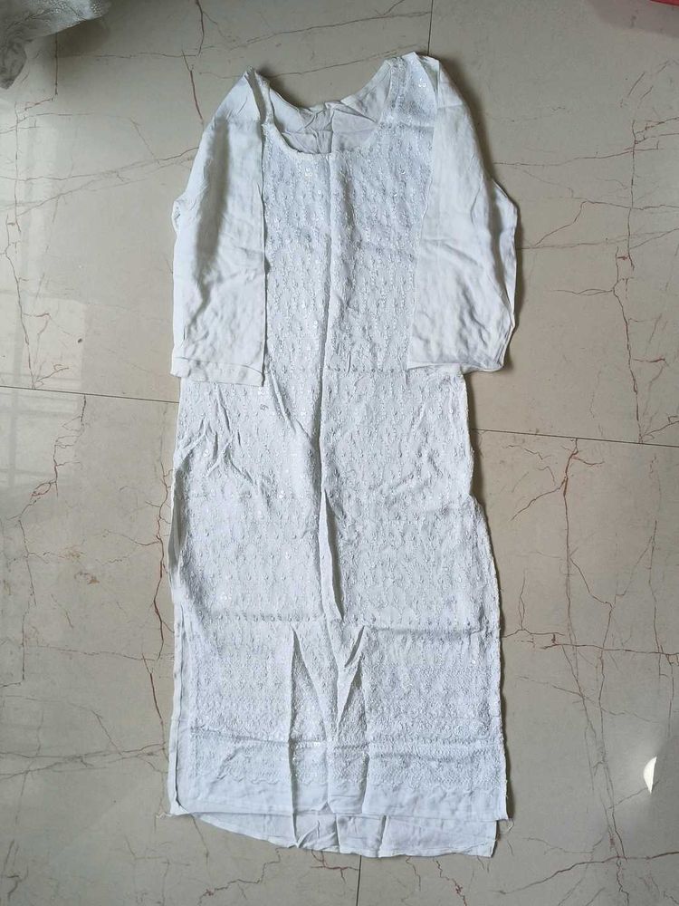 White kurta with little sequin work on it