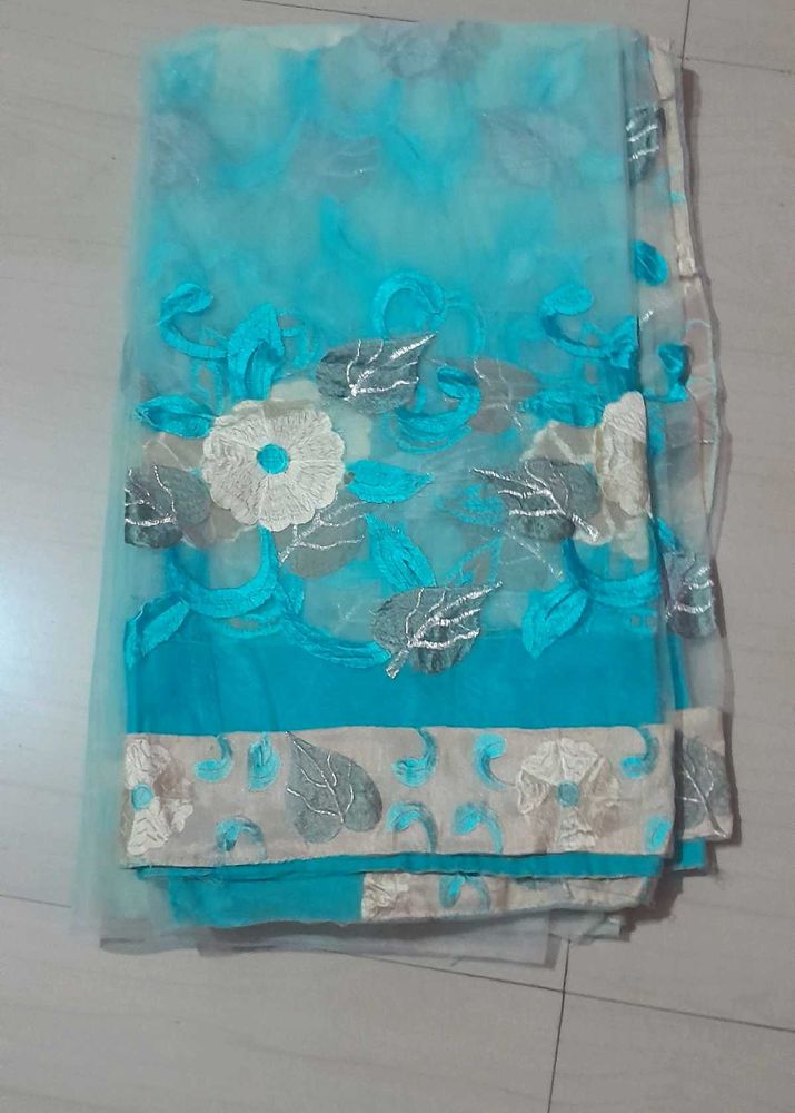 Blue Net Saree With Blouse And Petticoat