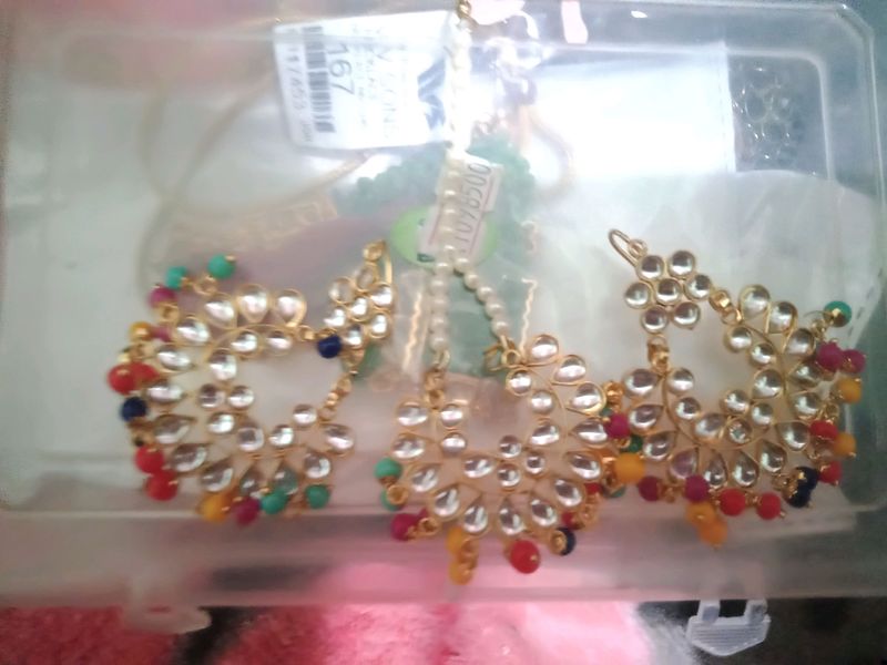 very beautiful multi colored earrings with mangtikka