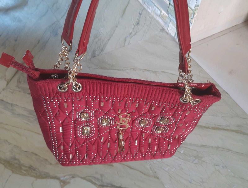 Red Quilted Handbag with Gold Detail