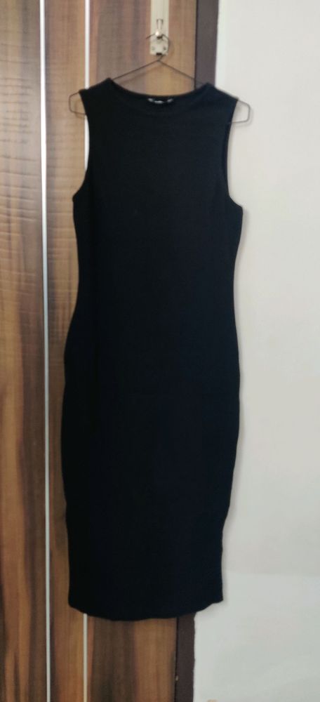 Black bodycon dress (New- unused)