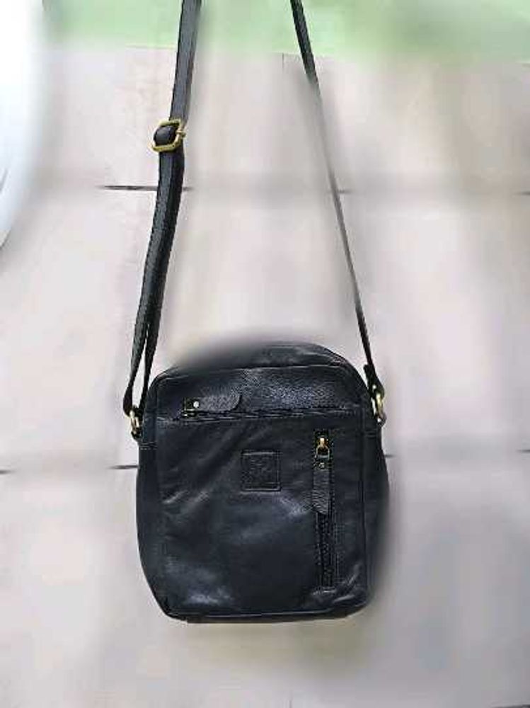 Good condition crossbody blue leather bag.