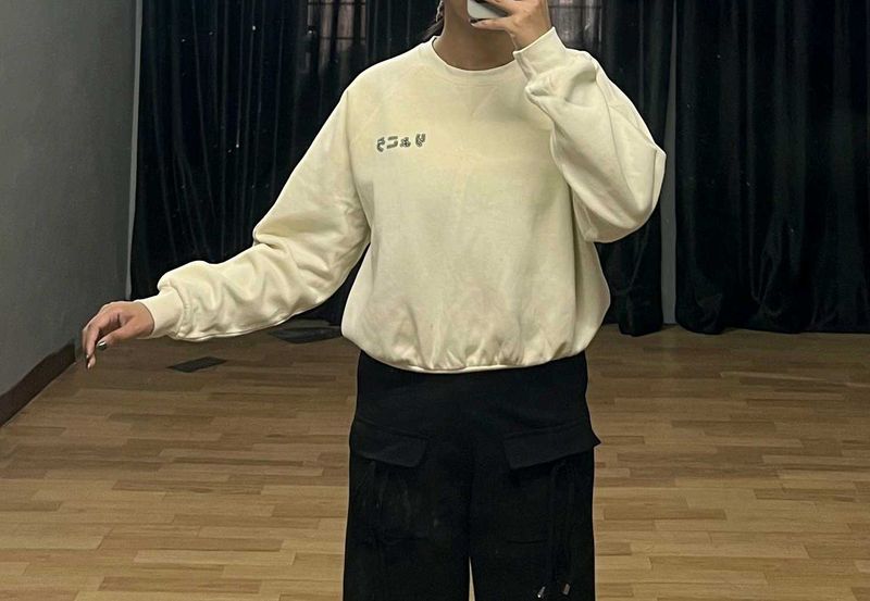 Cream Cropped Sweatshirt.