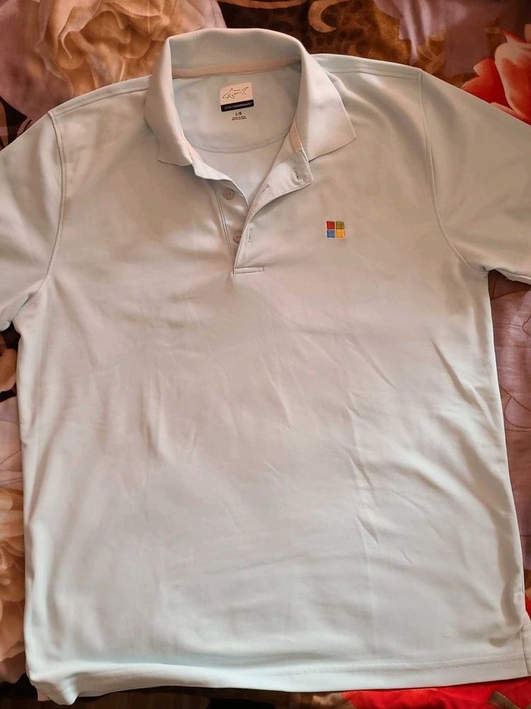 Greg Norman Men&#39;s Light Blue Polo Shirt