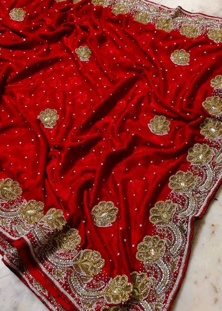Red. heavy Embroidered. expansive 💯 saree
