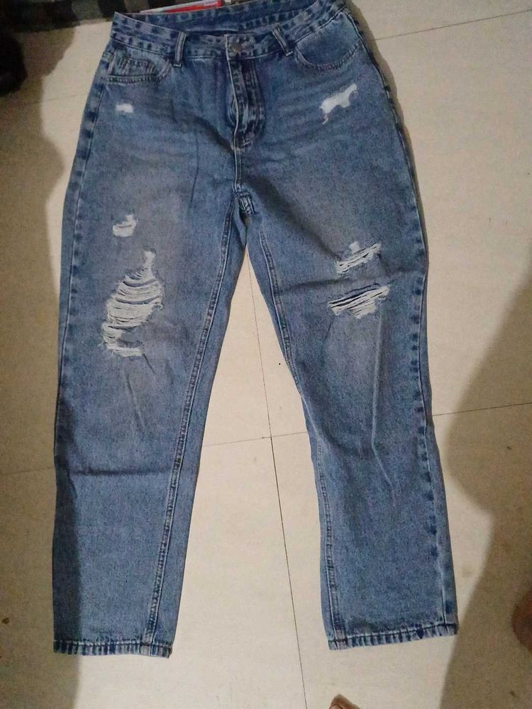 Ripped Blue Jeans
