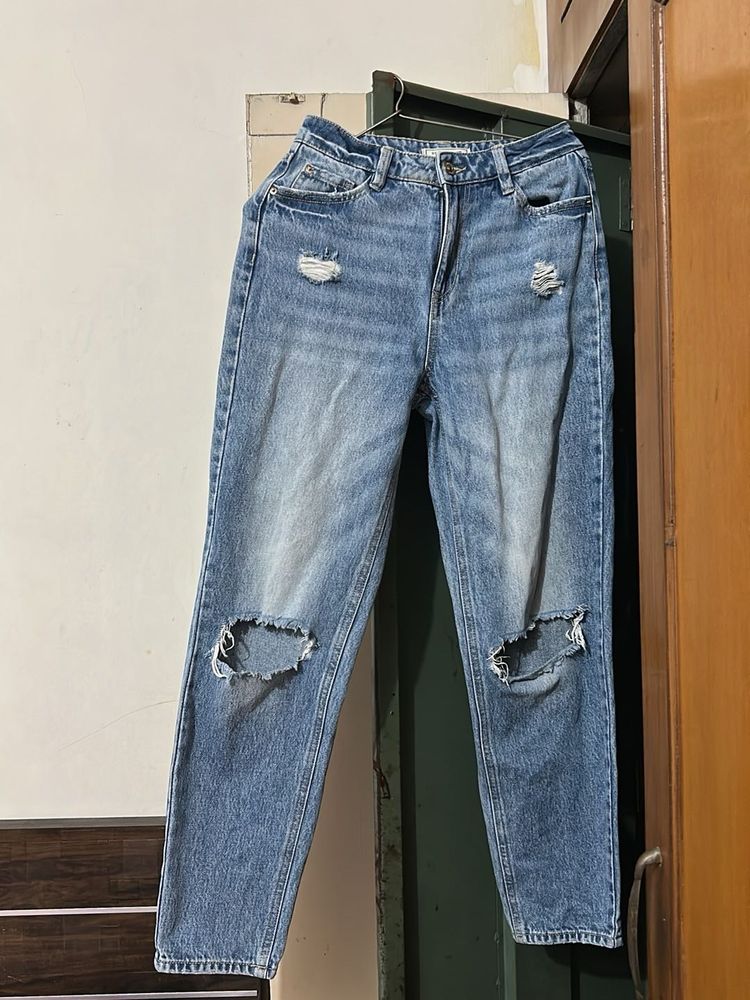 Ripped Knee Jeans