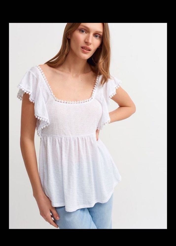 Branded White top