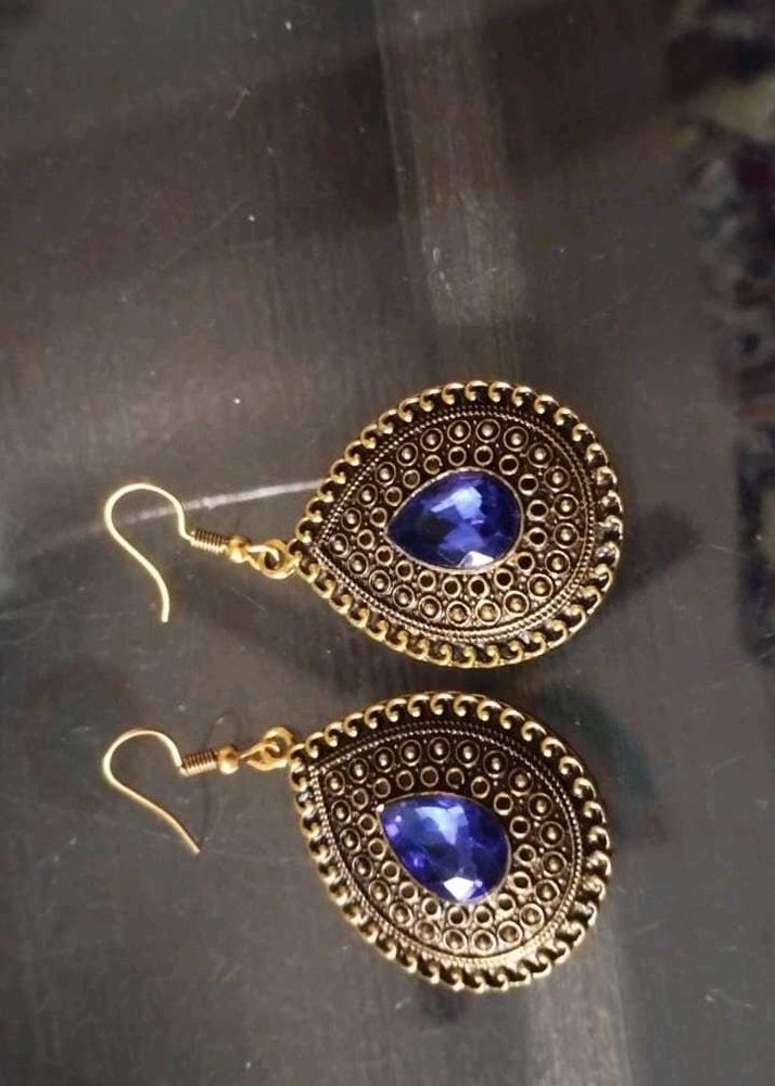 Golden Earing With Blue Gem