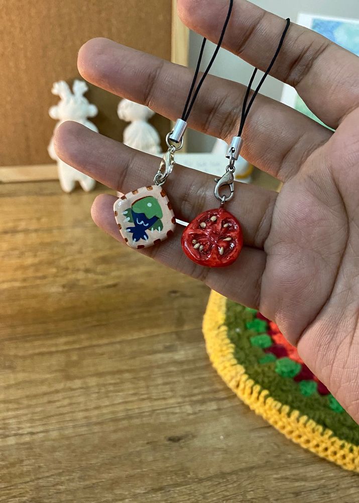 Handmade tomato and fish charms