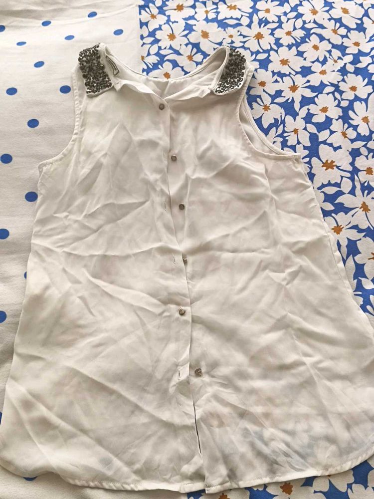 White Sleeveless Top
