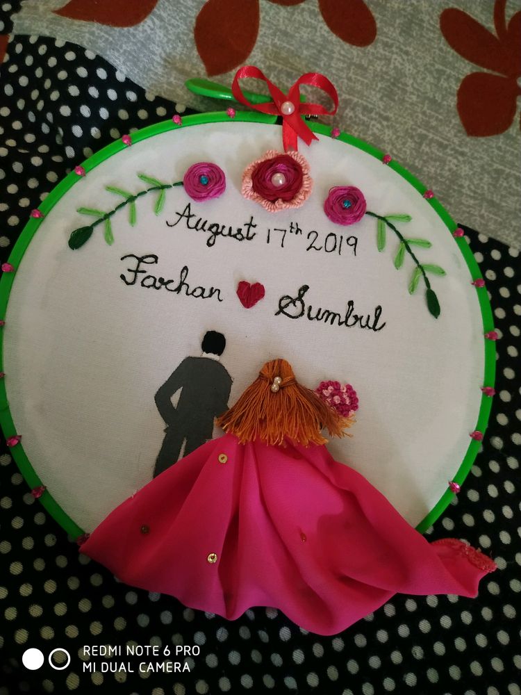 Beautiful customized couple hoop.