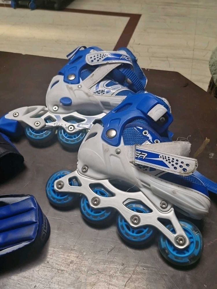 Blue and White Roller Blades