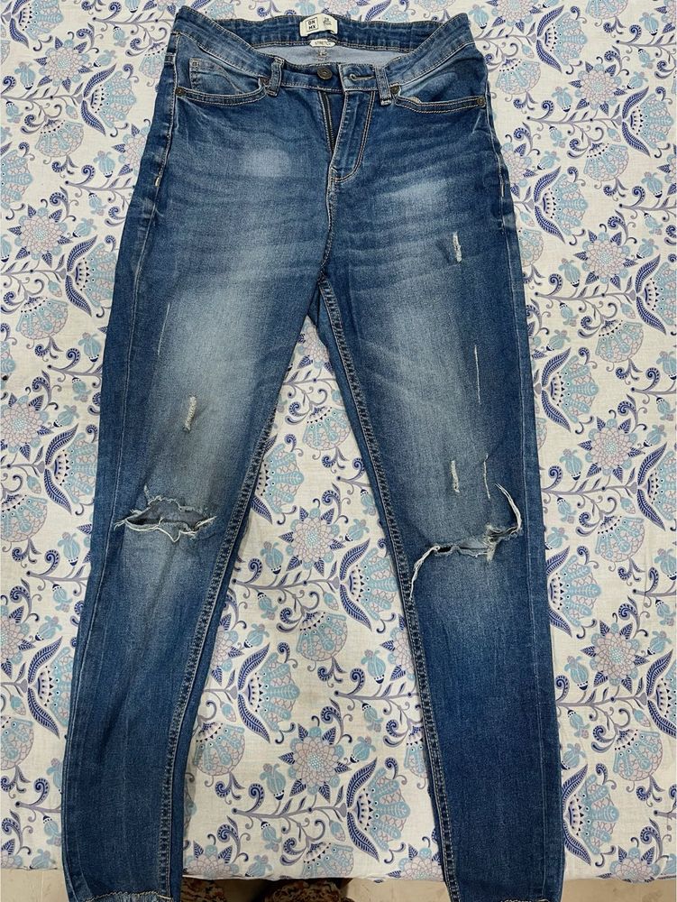 Ripped High-Waisted Jeans