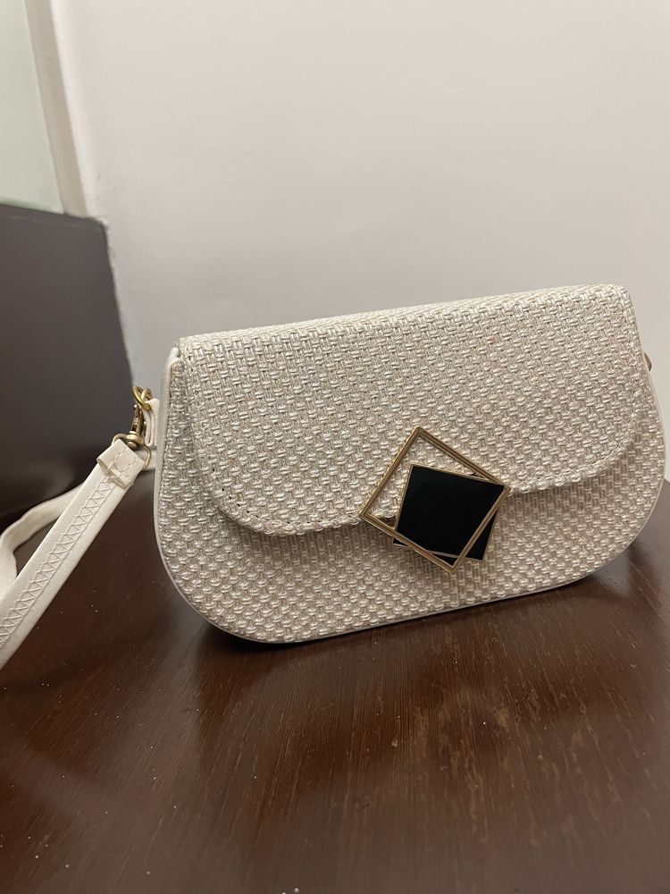 Beige sling bag