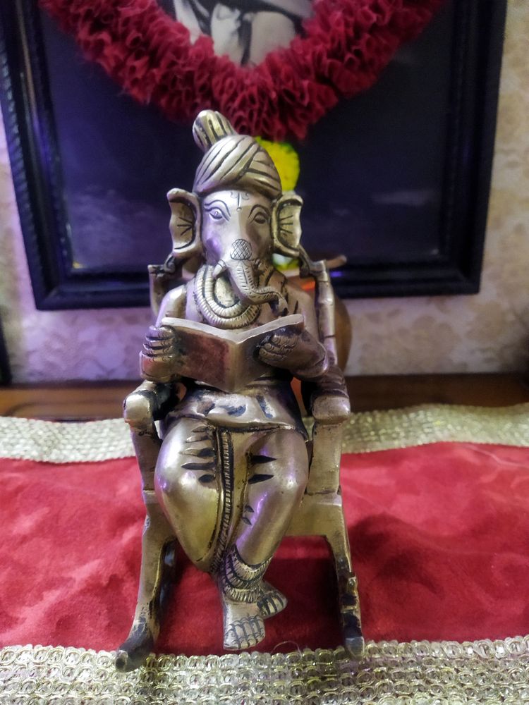 Ganesh Sitting On A Rocking Chair Idol