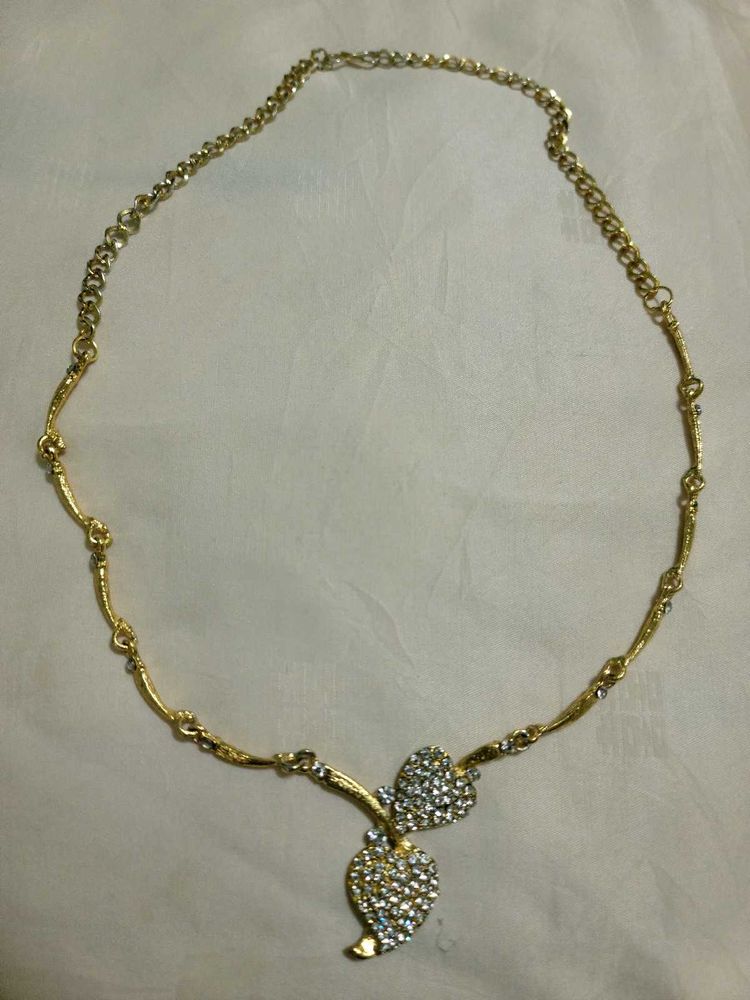 gold and silver necklace