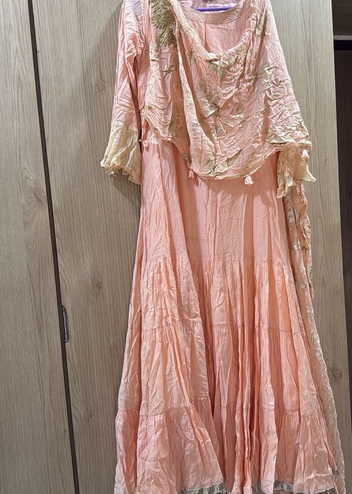 peach gown with cowl and attached drape