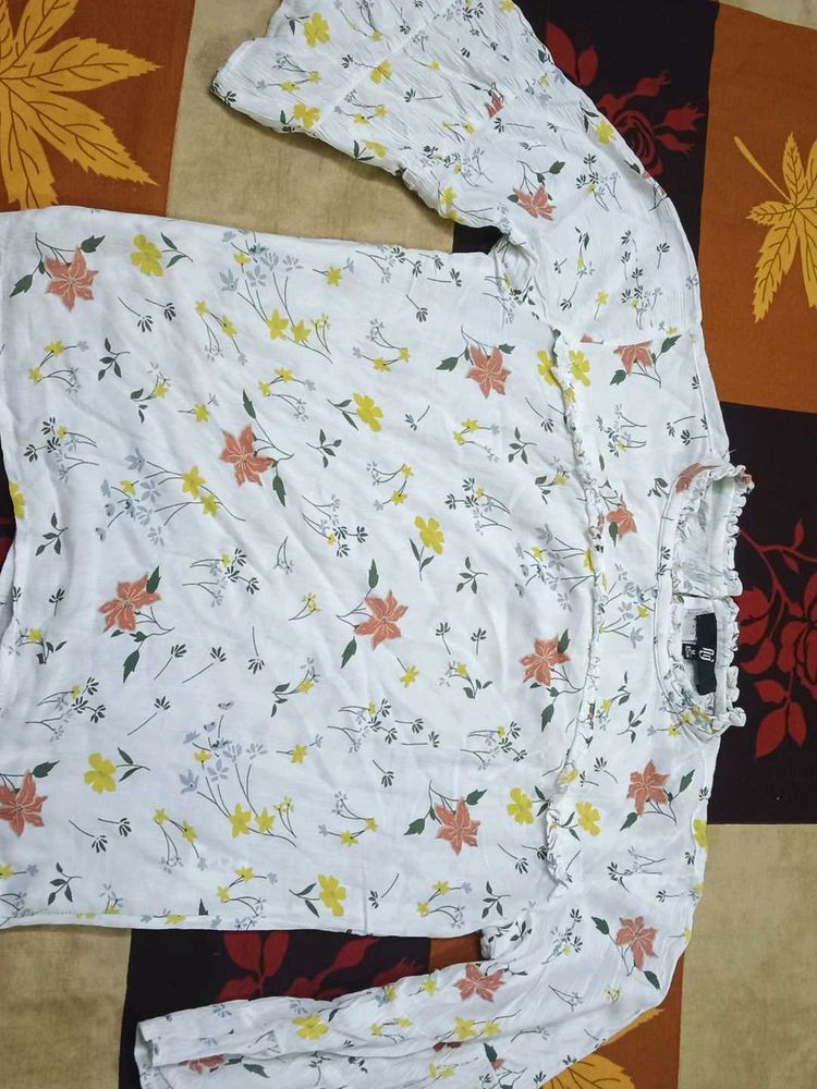 A Flowy White Floral Top