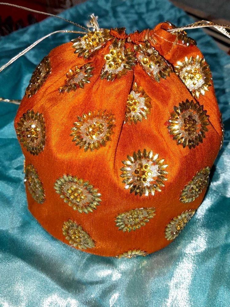 Potli Bag Wit Beautiful Golden Work