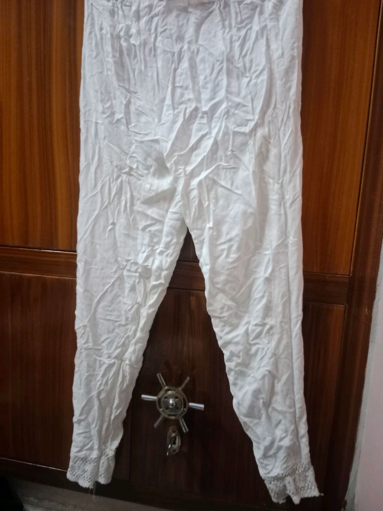A White Jegging With Design Downwards