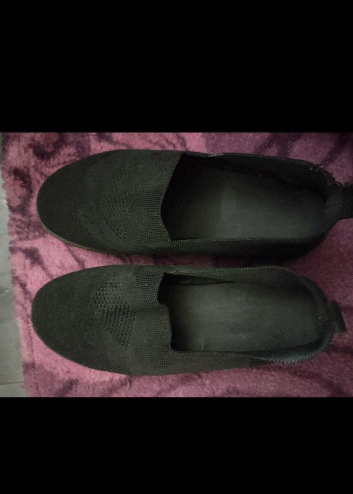 2 Pair Of Shoes