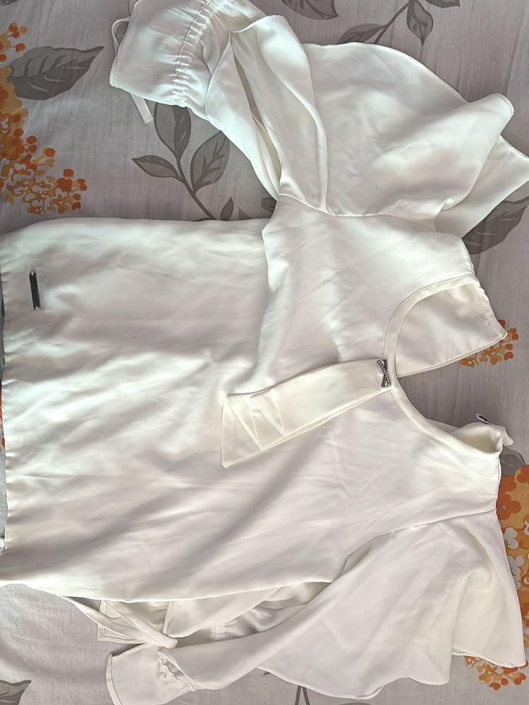 Elegant White Top with Flare Sleeves