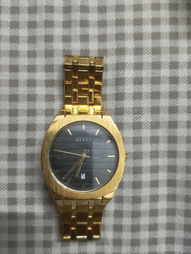 Gucci Gold Watch