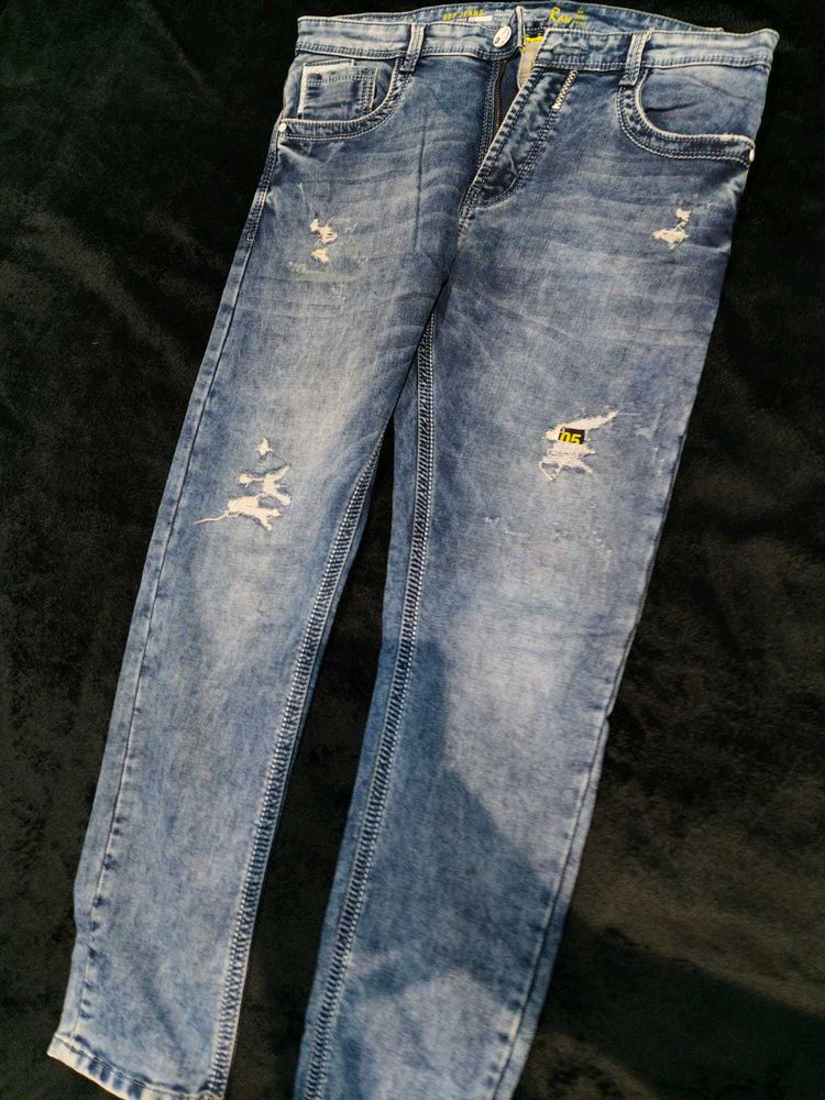 Distressed Denim Jeans
