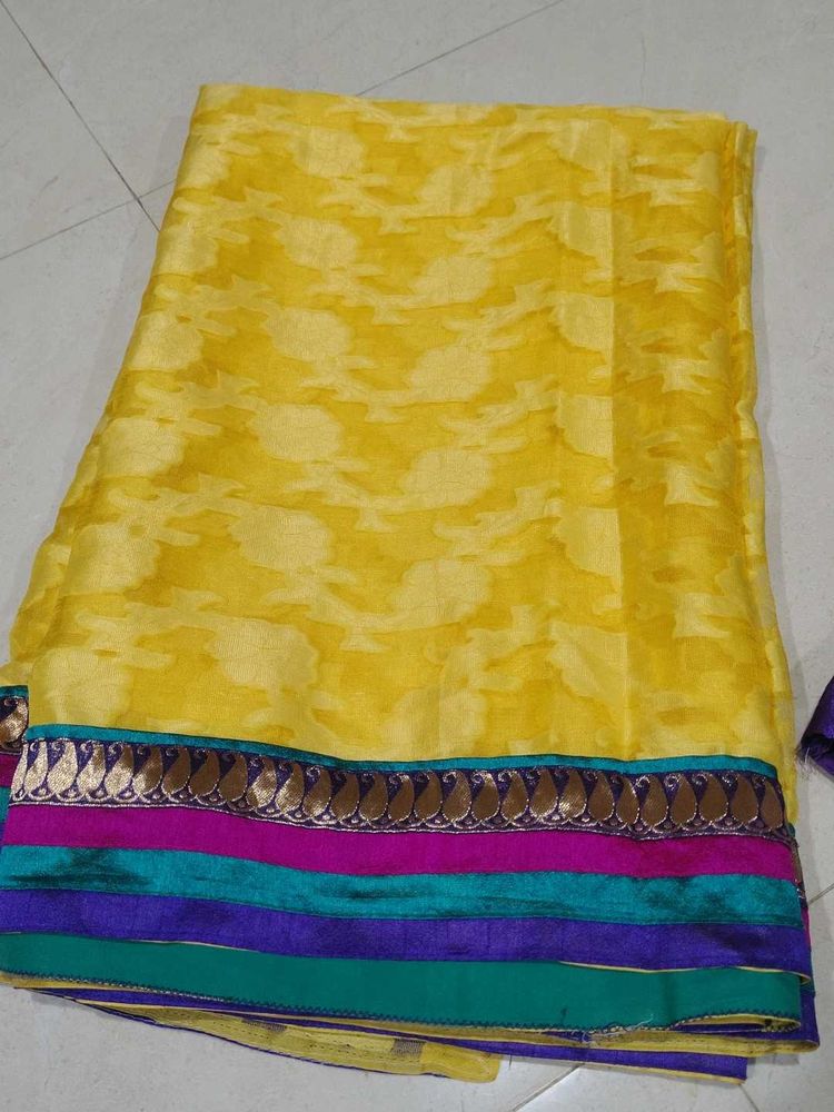 Yellow Saree with stitch blouse