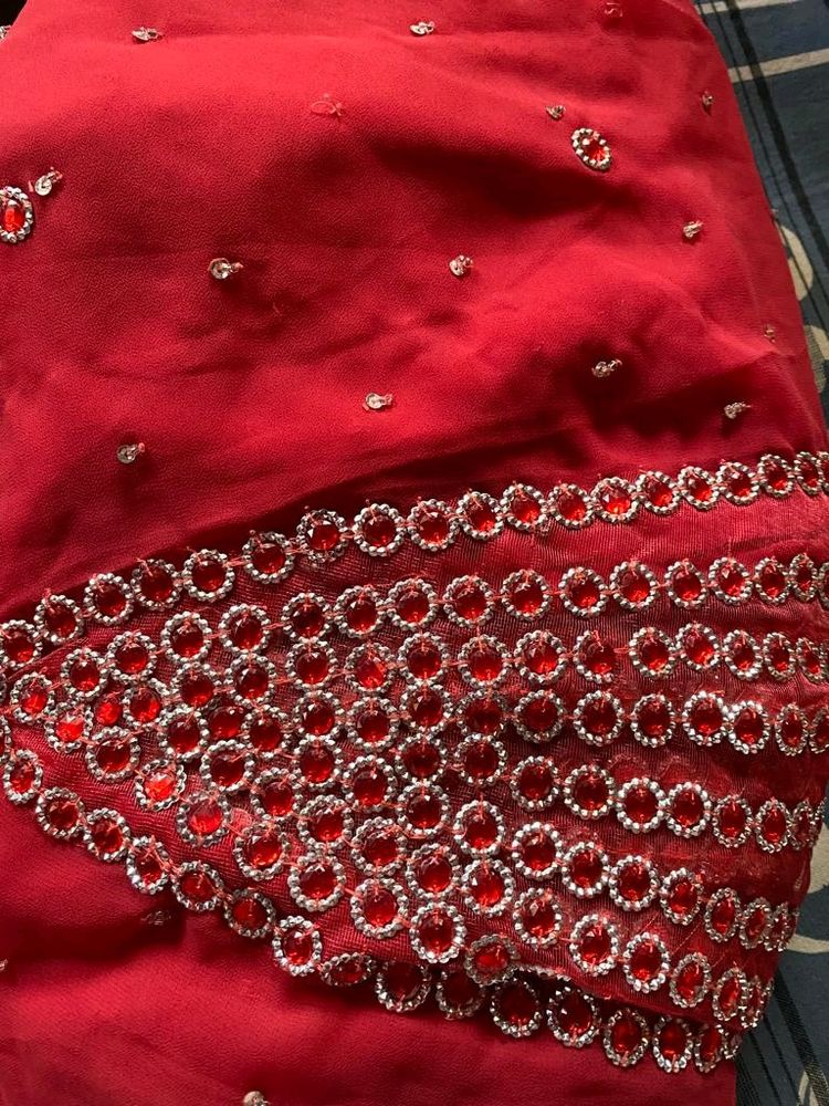 RED SAREE WITH GEMS DESIGN