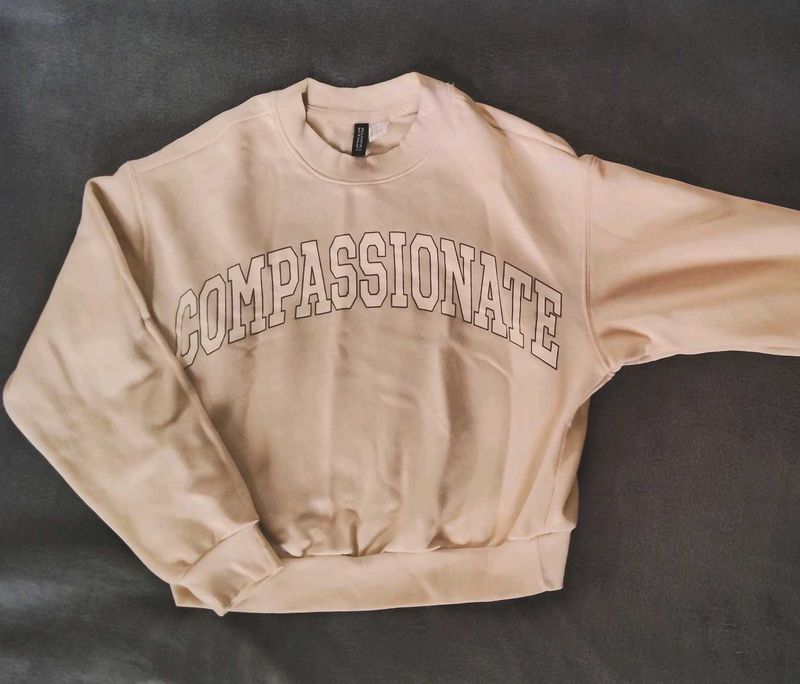 Compassionate Crewneck
