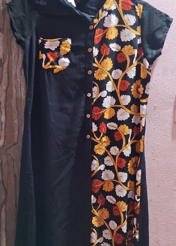 Stylish Black Tunic with Floral Accent