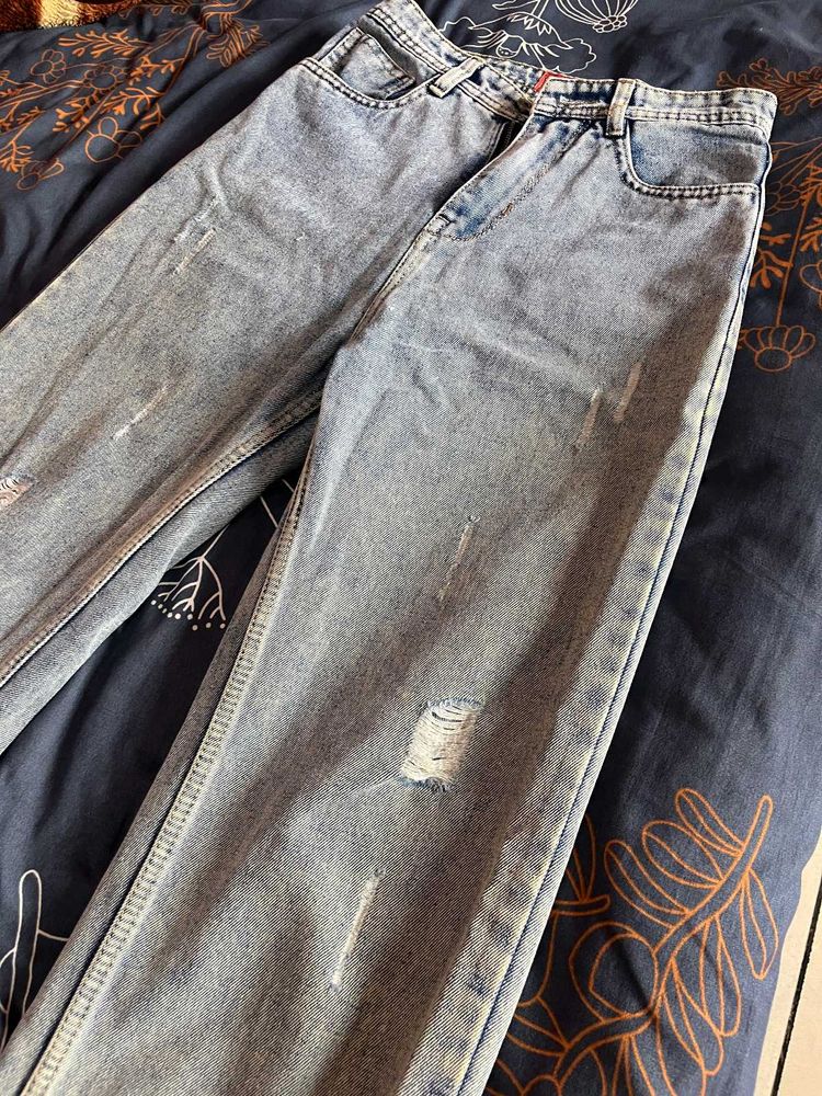 Ripped Light Wash Denim Jeans