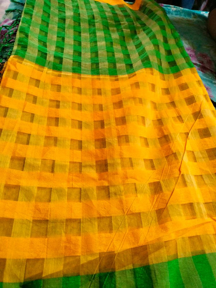 Yellow Saree  Green Blouse.