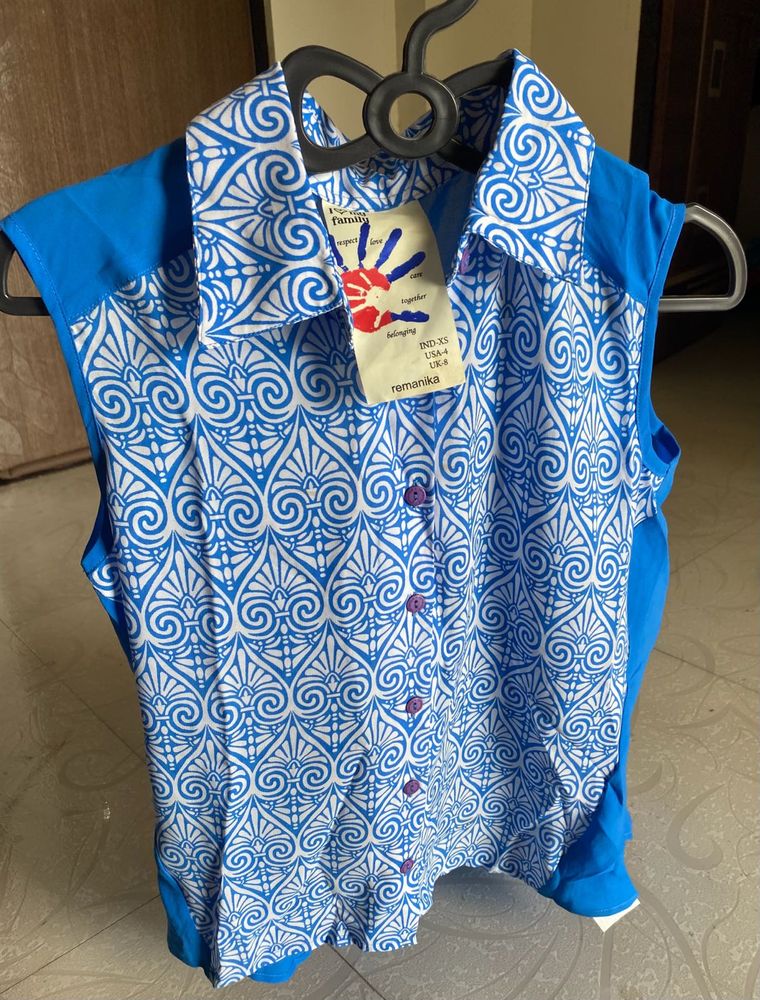 Brand New Remanika Sleeveless Shirt – Size XS