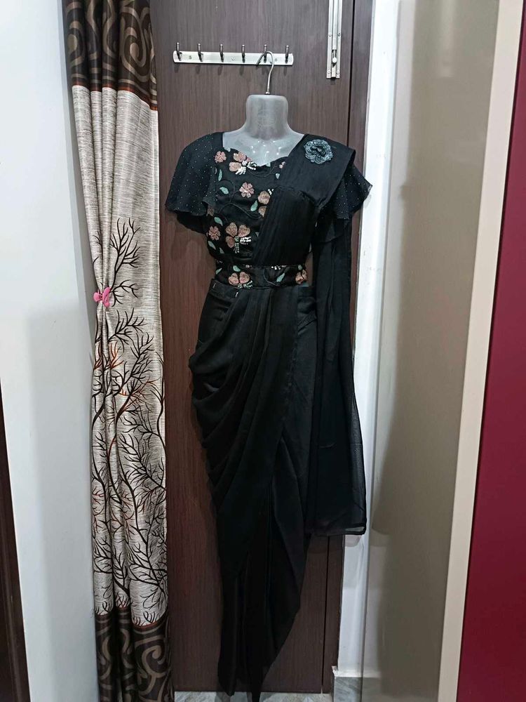 Elegant Black Saree with Floral Details And Belt