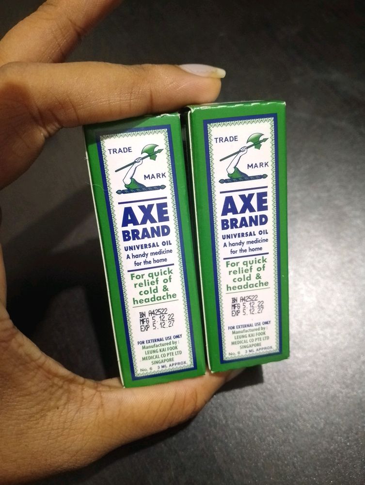axe brand universal pain relief oil, specially for headache, cold, cough and other body pains, manufactured in singapore and i bought from dubai, 1 bottle 3ml, 2 bottles for 99rs