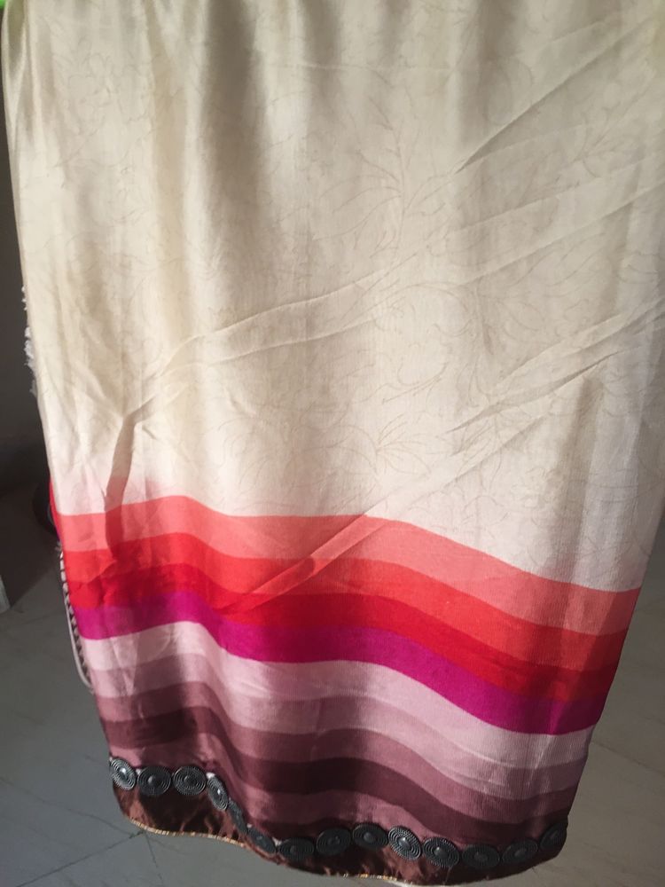 Cream Saari